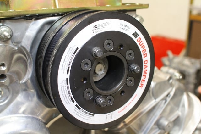 Our ATI Performance Products damper retains the serpentine drive for the air-conditioning belt. After all, what good is a thousand-horsepower car in SoCal without A/C?