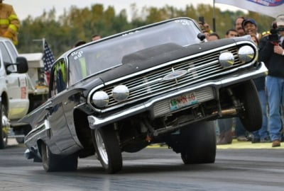 While it looks pretty cool in a photograph, this is a textbook example of the need for an anti-roll bar in a drag racing vehicle, as you can clearly see excessive twist from left to right.