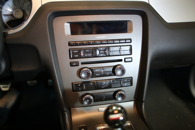 Starting with the factory SYNC dash panel, you can see the SYNC display at the top, the CD and HVAC controls below. The Raxiom Install doesn't alter the order of the components, but does shift their position some to make room for the new display.
