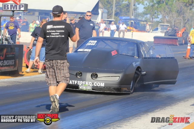 Frank Meshaw took low ET by a wide margin in Pro Drag Radial running a 4.46 at 170 over Mike Freeman who lost traction early. Here Todd Brash from TRZ Motorsports backs Meshaw up into the groove.